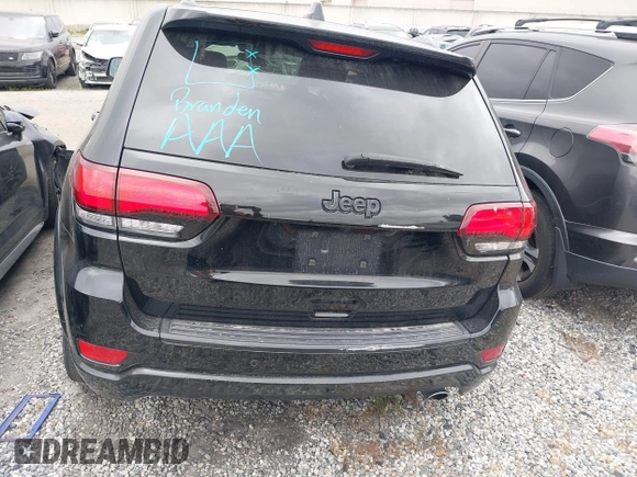 2021 Jeep Grand Cherokee Laredo X with VIN 1C4RJEAG9MC681776, listed as a IAAI auction lot 42116720 with 51,503 mi miles and . Bid and sale history available at DreamBid. Image 16.