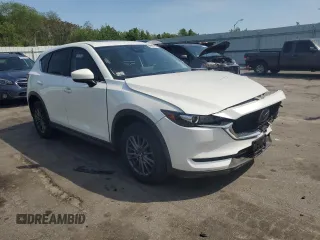 2021 Mazda CX-5 Touring with VIN JM3KFBCM7M0386995, listed as a Copart auction lot 55255784 with 43,561 mi miles and Salvage Title. Bid and sale history available at carsss.com. Image 4.