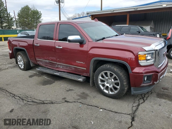 2015 GMC Sierra 1500 Denali with VIN 3GTU2WEC0FG109273, listed as a Copart auction lot 52823815 with 102,079 mi miles and Salvage Title. Bid and sale history available at carsss.com. Image 4.
