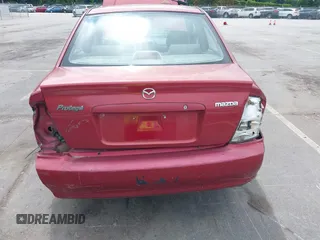 2002 Mazda Protege DX z VIN JM1BJ225821586258, wystawiony jako IAAI lot #42366064 z przebiegiem 167 332 mil mil oraz . Historia ofert i sprzedaży dostępna na DreamBid. Obrazek 16.