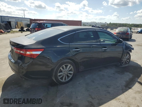 2013 Toyota Avalon XLE with VIN 4T1BK1EB2DU019243, listed as a Copart auction lot 55155725 with 256,267 mi miles and Salvage Title. Bid and sale history available at DreamBid. Image 3.