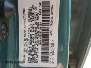 2009 Toyota Corolla with VIN 1NXBU40E29Z118164, listed as a Copart auction lot 52091785 with 117,486 mi miles and Salvage Title. Bid and sale history available at carsss.com. Image 12.