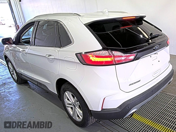 2019 Ford Edge SEL with VIN 2FMPK3J9XKBC37759, listed as a IAAI auction lot 42666643 with 103,812 mi miles and . Bid and sale history available at DreamBid. Image 13.
