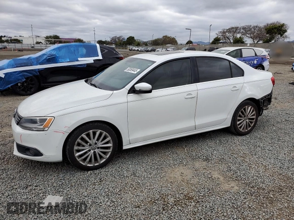 2014 Volkswagen Jetta TDI w/Premium/Nav with VIN 3VWLL7AJ0EM332476, listed as a Copart auction lot 50069445 with 153,974 mi miles and Salvage title. Bid and sale history available at DreamBid. Image 1.