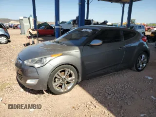 2013 Hyundai Veloster w/Gray Int z VIN KMHTC6AD6DU104446, wystawiony jako Copart lot #61306955 z przebiegiem 132 092 mil mil oraz Czysty tytuł • Clean title. Historia ofert i sprzedaży dostępna na DreamBid. Obrazek 1.