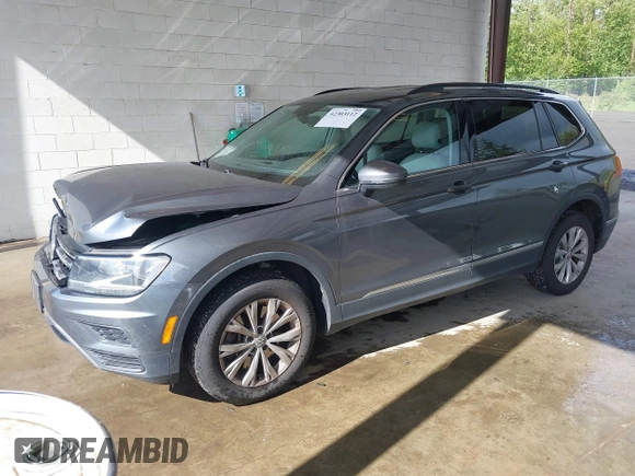 2018 Volkswagen Tiguan SEL with VIN 3VV3B7AX6JM054849, listed as a IAAI auction lot 42303112 with 87,574 mi miles and . Bid and sale history available at DreamBid. Image 2.