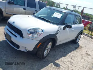 2014 MINI Countryman S z VIN WMWZC5C52EWP39083, wystawiony jako IAAI lot #42409957 z przebiegiem 73 497 mil mil oraz . Historia ofert i sprzedaży dostępna na DreamBid. Obrazek 2.