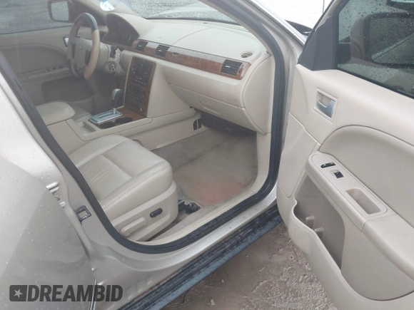 2005 Ford Five Hundred SEL z VIN 1FAFP24145G140044, wystawiony jako IAAI lot #42457383 z przebiegiem 196 564 mil mil oraz . Historia ofert i sprzedaży dostępna na DreamBid. Obrazek 5.