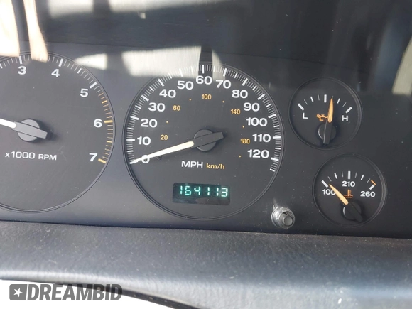 2004 Jeep Grand Cherokee Laredo with VIN 1J4GW48S54C314056, listed as a IAAI auction lot 42096065 with 164,113 mi miles. Bid and sale history available at carsss.com. Image 7.