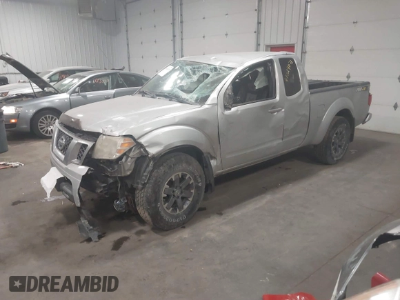 2015 Nissan Frontier SV with VIN 1N6AD0CW4FN751068, listed as a IAAI auction lot 41024078 with 900,000 mi miles and . Bid and sale history available at DreamBid. Image 2.