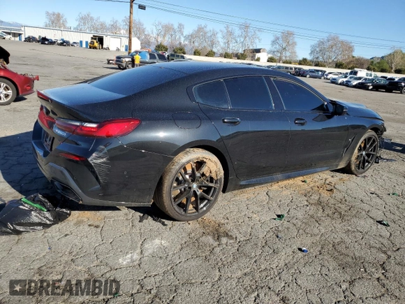 2023 BMW 8 Series M850i with VIN WBAGV8C06PCL57473, listed as a Copart auction lot 39398193 with Not provided miles and . Bid and sale history available at DreamBid. Image 3.