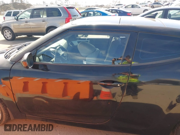 2013 Hyundai Veloster w/Black Int with VIN KMHTC6AD4DU132701, listed as a IAAI auction lot 42021759 with 102,840 mi miles and . Bid and sale history available at DreamBid. Image 14.