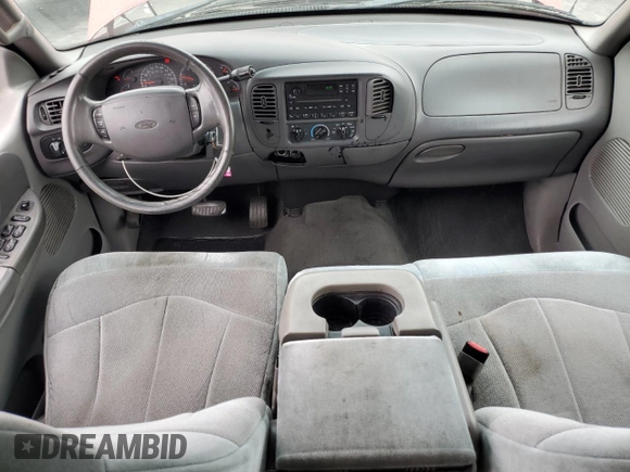 2001 Ford F-150 XLT with VIN 1FTRW07WX1KE51166, listed as a Copart auction lot 60164025 with 157,035 mi miles and Salvage title. Bid and sale history available at DreamBid. Image 8.