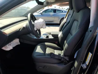 2024 Tesla Model Y Long Range с VIN 7SAYGDEE4RA243738, выставлен на аукционе Copart как лот 48953885 с пробегом Не указан миль и Списание • Salvage title. История ставок и продаж доступна на DreamBid. Изображение 7.