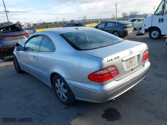 2001 Mercedes-Benz CLK-Class with VIN WDBLJ65G01T083995, listed as a IAAI auction lot 41643860 with 194,174 mi miles. Bid and sale history available at carsss.com. Image 3.