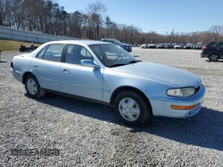 1992 Toyota Camry LE with VIN 4T1SK12E7NU001465, listed as a Copart auction lot 46937175 with 141,334 mi miles and Salvage Title. Bid and sale history available at carsss.com. Image 4.