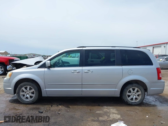 2008 Chrysler Town & Country Touring with VIN 2A8HR54P88R671360, listed as a IAAI auction lot 42104217 with 212,828 mi miles and . Bid and sale history available at DreamBid. Image 14.
