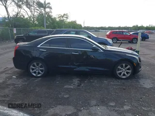 2013 Cadillac ATS with VIN 1G6AA5RX4D0174127, listed as a IAAI auction lot 42619918 with 119,174 mi miles and . Bid and sale history available at DreamBid. Image 13.