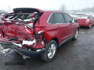 2015 Ford Edge SEL with VIN 2FMTK4J82FBC08483, listed as a IAAI auction lot 41552998 with 124,720 mi miles. Bid and sale history available at carsss.com. Image 4.