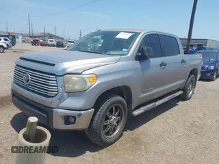 2014 Toyota Tundra SR5 z VIN 5TFEM5F15EX068560, wystawiony jako IAAI lot #42265351 z przebiegiem 163 294 mil mil oraz . Historia ofert i sprzedaży dostępna na DreamBid. Obrazek 2.