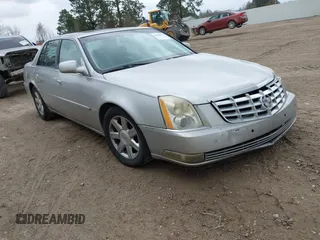 2006 Cadillac DTS 1SC z VIN 1G6KD57Y56U126557, wystawiony jako IAAI lot #41565515 z przebiegiem 251 316 mil mil oraz . Historia ofert i sprzedaży dostępna na DreamBid. Obrazek 1.