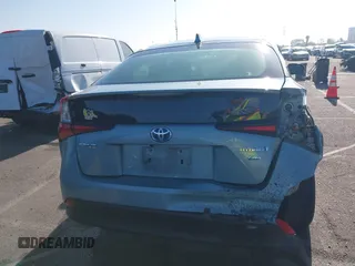 2022 Toyota Prius L Eco with VIN JTDKAMFU8N3188831, listed as a IAAI auction lot 42021222 with 39,629 mi miles and . Bid and sale history available at DreamBid. Image 17.