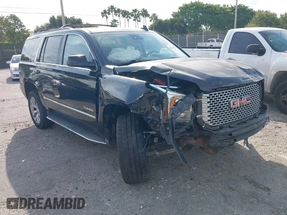 2015 GMC Yukon SLT with VIN 1GKS1BKC1FR539194, listed as a IAAI auction lot 41864424 with 1 mi miles. Bid and sale history available at carsss.com. Image 1.