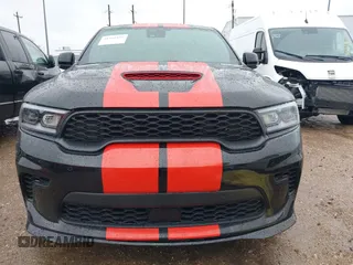 2023 Dodge Durango SRT Hellcat Premium with VIN 1C4SDJH99PC584770, listed as a IAAI auction lot 41562157 with 14,598 mi miles and . Bid and sale history available at DreamBid. Image 6.