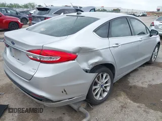 2017 Ford Fusion SE with VIN 3FA6P0HD3HR273593, listed as a IAAI auction lot 42136079 with 101,545 mi miles and . Bid and sale history available at DreamBid. Image 4.