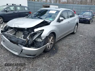 2014 Nissan Altima 2.5 S with VIN 1N4AL3APXEC402242, listed as a IAAI auction lot 42037912 with 140,010 mi miles. Bid and sale history available at carsss.com. Image 2.