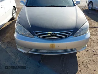 2006 Toyota Camry LE z VIN 4T1BF30K96U115963, wystawiony jako IAAI lot #41616833 z przebiegiem 237 404 mil mil oraz . Historia ofert i sprzedaży dostępna na DreamBid. Obrazek 6.