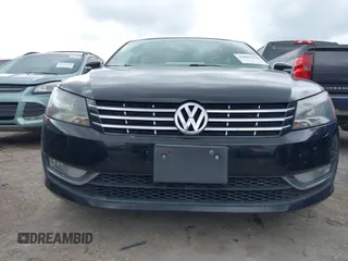2014 Volkswagen Passat TDI SEL Premium with VIN 1VWCN7A33EC068280, listed as a IAAI auction lot 42086420 with 153,656 mi miles. Bid and sale history available at carsss.com. Image 12.