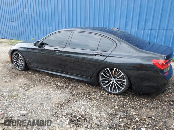 2019 BMW 7 Series 740i with VIN WBA7E2C57KB217455, listed as a Copart auction lot 69580773 with 74,717 mi miles and . Bid and sale history available at DreamBid. Image 2.