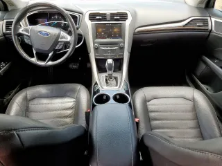 2013 Ford Fusion SE Hybrid with VIN 3FA6P0LU0DR267560, listed as a Copart auction lot 60563415 with 140,998 mi miles and Clean title. Bid and sale history available at DreamBid. Image 8.