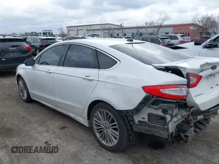 2015 Ford Fusion SE with VIN 3FA6P0H9XFR181132, listed as a IAAI auction lot 41075635 with 216,089 mi miles and . Bid and sale history available at DreamBid. Image 3.