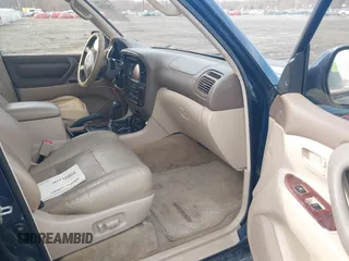 2002 Toyota Land Cruiser with VIN JTEHT05J122018974, listed as a IAAI auction lot 41543290 with 266,926 mi miles. Bid and sale history available at carsss.com. Image 5.