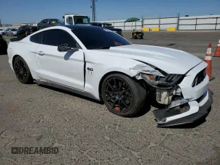 2016 Ford Mustang GT with VIN 1FA6P8CF9G5261392, listed as a Copart auction lot 61004015 with 102,933 mi miles and Salvage title. Bid and sale history available at DreamBid. Image 4.