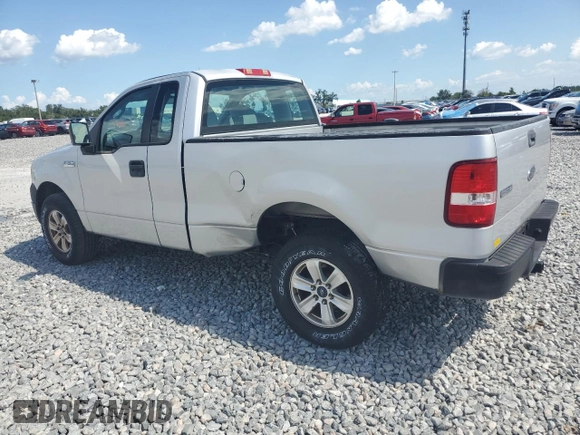 2005 Ford F-150 XL with VIN 1FTRF12225NC03167, listed as a Copart auction lot 61046445 with 153,050 mi miles and Salvage title. Bid and sale history available at DreamBid. Image 2.