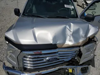 2016 Ford F-150 XL with VIN 1FTEW1CG4GKD40804, listed as a Copart auction lot 50699595 with 116,489 mi miles and Salvage Title. Bid and sale history available at DreamBid. Image 11.