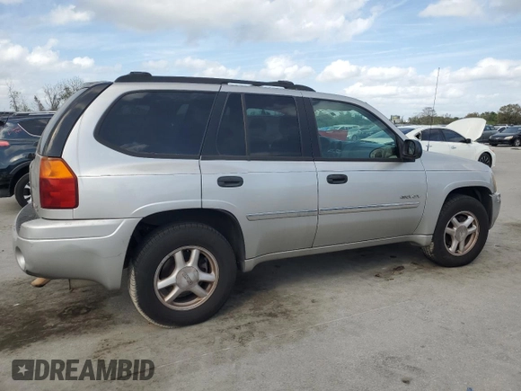 2006 GMC Envoy SLT with VIN 1GKDS13S662139632, listed as a Copart auction lot 47387245 with 246,803 mi miles and Salvage Title. Bid and sale history available at carsss.com. Image 3.