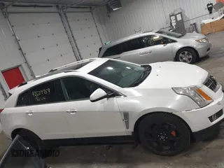 2012 Cadillac SRX Premium Collection with VIN 3GYFNFE39CS561614, listed as a IAAI auction lot 42529959 with 59,088 mi miles and . Bid and sale history available at DreamBid. Image 13.