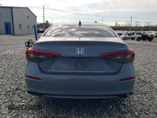 2023 Honda Civic Sport z VIN 2HGFE2F50PH528025, wystawiony jako Copart lot #54514405 z przebiegiem 15 504 mil mil oraz Szkody całkowita. Historia ofert i sprzedaży dostępna na DreamBid. Obrazek 6.