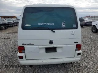 2000 Volkswagen EuroVan с VIN WV2MH4701YH035166, выставлен на аукционе Copart как лот 55680175 с пробегом 220 080 миль миль и Чистый • Clean title. История ставок и продаж доступна на DreamBid. Изображение 6.