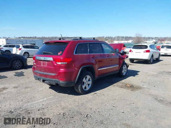 2012 Jeep Grand Cherokee Laredo with VIN 1C4RJFAG4CC297151, listed as a IAAI auction lot 41903618 with 222,357 mi miles. Bid and sale history available at carsss.com. Image 4.