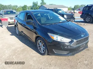 2018 Ford Focus SE with VIN 1FADP3FEXJL286396, listed as a IAAI auction lot 42634912 with 73,769 mi miles and . Bid and sale history available at DreamBid. Image 1.