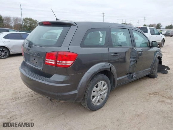 2015 Dodge Journey American Value Pkg with VIN 3C4PDCABXFT516866, listed as a IAAI auction lot 41368372 with 169,026 mi miles. Bid and sale history available at carsss.com. Image 4.