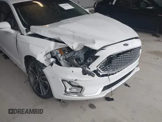 2019 Ford Fusion Titanium with VIN 3FA6P0K95KR271291, listed as a IAAI auction lot 41983320 with 71,962 mi miles and . Bid and sale history available at DreamBid. Image 17.