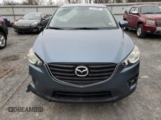 2016 Mazda CX-5 Grand Touring with VIN JM3KE4DY7G0761594, listed as a Copart auction lot 51514595 with 58,250 mi miles and Salvage Title. Bid and sale history available at DreamBid. Image 5.