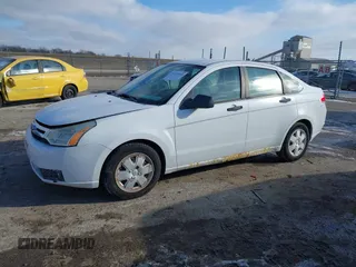 2008 Ford Focus S with VIN 1FAHP34N98W264337, listed as a IAAI auction lot 41414660 with 151,938 mi miles. Bid and sale history available at carsss.com. Image 2.