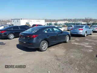 2016 Mazda 3 i Sport with VIN JM1BM1U73G1337468, listed as a IAAI auction lot 41824105 with 96,959 mi miles. Bid and sale history available at carsss.com. Image 4.